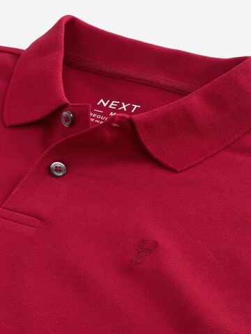 Next T-shirt i röd