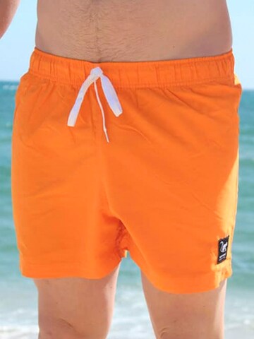 Surf Monkey - Bermudas en naranja