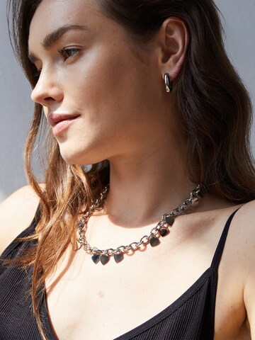 Echtzeit Earrings in Silver: front