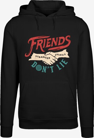 F4NT4STIC Sweatshirt 'Stranger Things Friends Dont Lie Netflix TV Series' in Zwart: voorkant