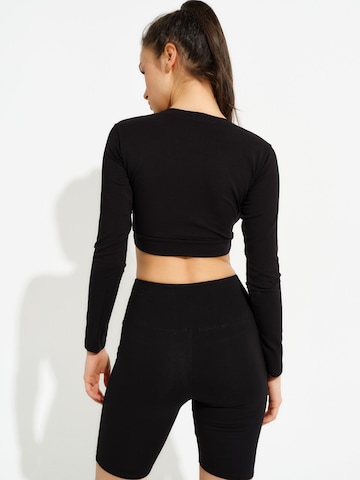 Evoni Funktionsshirt 'Bauchfrei'‌‌‌‌ in Schwarz