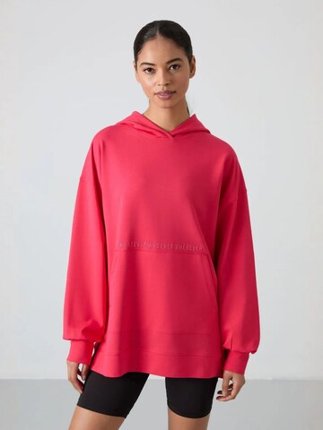 Tommy Life Sweatshirt in Pink: front