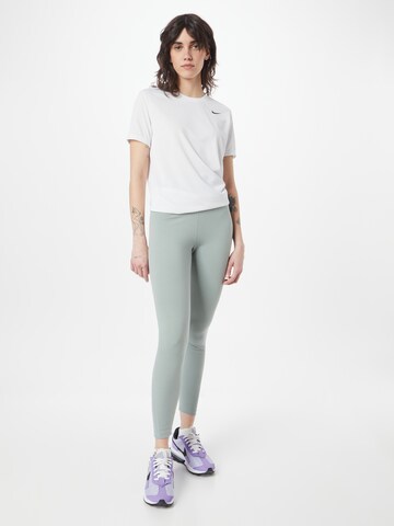 NIKE Skinny Športne hlače 'One' | zelena barva