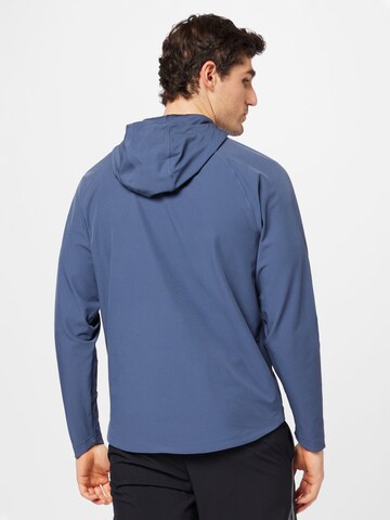UNDER ARMOURSportska jakna 'Unstoppable' - plava boja