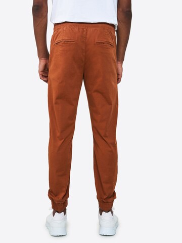 recolution Tapered Chino Pants in Brown