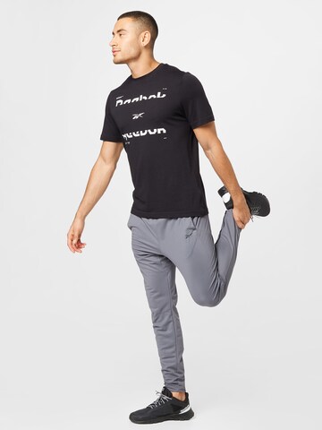 Effilé Pantalon de sport Reebok en gris