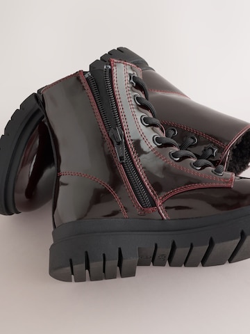 Bottes Next en rouge