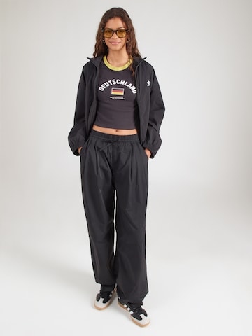 LEVI'S ® Tričko 'X WC RINGER' - Čierna