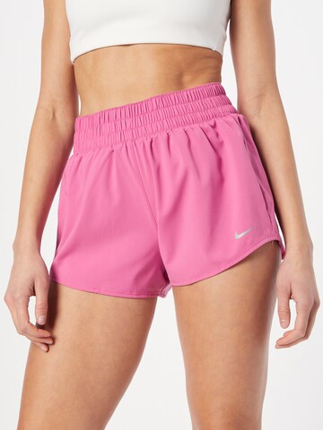 NIKE Regular Sports trousers in Pink