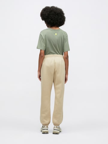 Nike Sportswear Tapered Hose 'Phoenix Fleece' in Braun