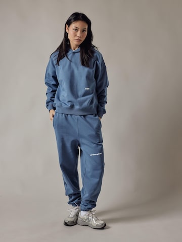 OWN Off With Nature - Sudadera 'Cappuccio' en azul