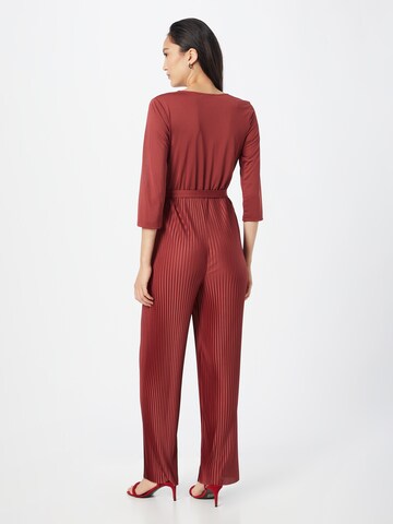 Tuta jumpsuit 'Saskia' di ABOUT YOU in rosso