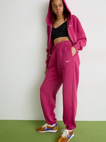 Nike SportswearTapered Hlače 'Phoenix Fleece' - roza boja