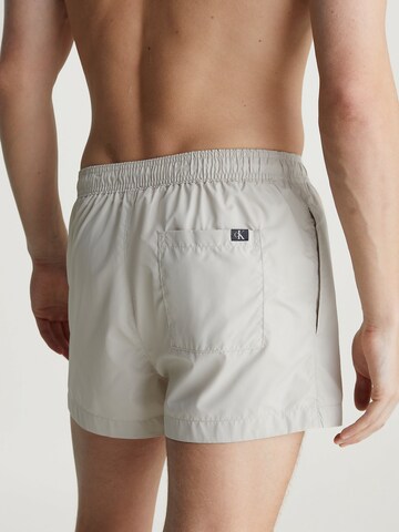 Calvin Klein Swimwear Board Shorts in Beige