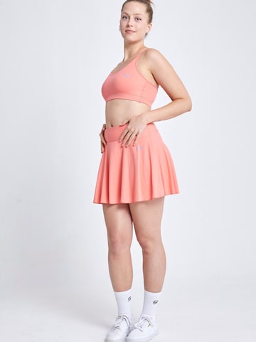 SPORTKIND - Falda 'Advantage' en naranja