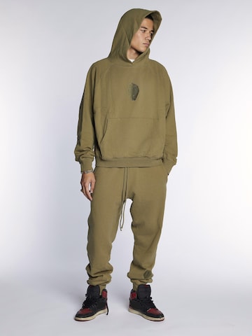 Loosefit Pantalon 'Embroidered shell sweatpants' BARRYAN en vert