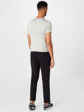 Regular Pantalon de sport 'Essentials' PUMA en noir