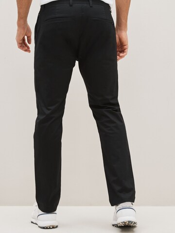 Next Slimfit Hose in Schwarz