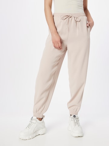 ABOUT YOU Loose fit Trousers 'Romina' in Pink: front