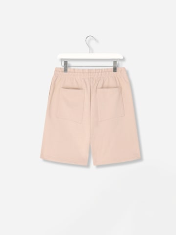 Mansour Loosefit Sportbroek 'Paris College' in Roze