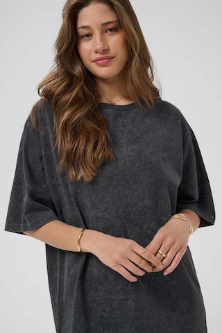 Cream - Camiseta 'Okina' en negro