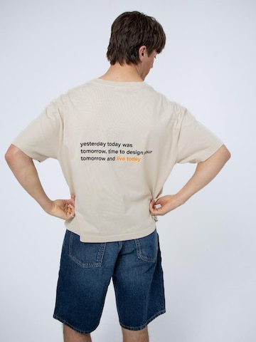 BAYSIDE BOUND Shirt 'THE SUNRISE UNISEX BOXY TEE' in Beige: voorkant