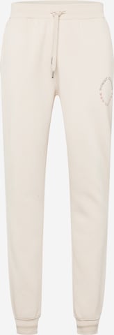 Effilé Pantalon TOMMY HILFIGER en beige : devant