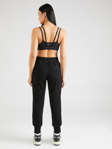 Effilé Pantalon de sport Varley en noir