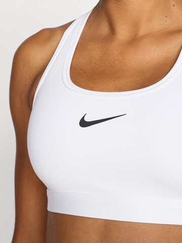 NIKE Bustier Biustonosz sportowy 'SWSH' w kolorze biały