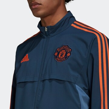 Veste de sport 'Manchester United Condivo 22' ADIDAS SPORTSWEAR en bleu