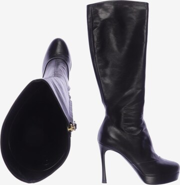 YVES SAINT LAURENT Dress Boots in 37 in Black: front