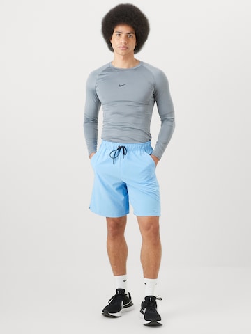 NIKE Normální Sportovní kalhoty – modrá