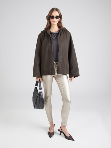 Skinny Jean Cartoon en or