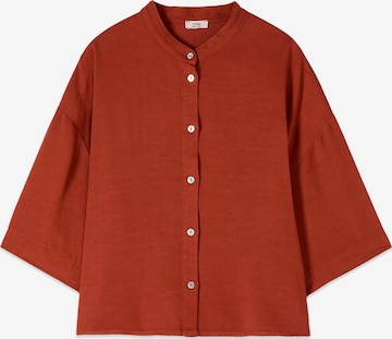 Camicia da donna di oltre in arancione: frontale