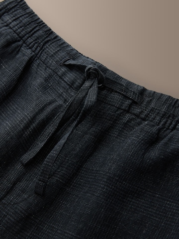 Loosefit Pantalon chino 'Signature Heritage' Next en noir