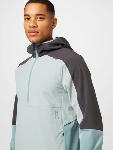 Veste de sport UNDER ARMOUR en vert