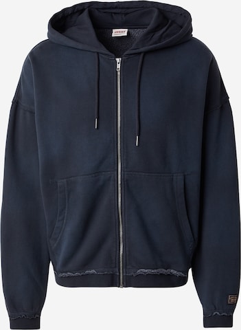 Veste de survêtement GUESS Originals en bleu : devant