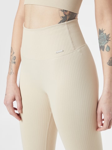 Skinny Pantaloni sportivi di aim'n in beige