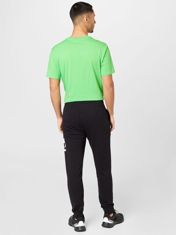 Champion Authentic Athletic Apparel Tapered Hose in Schwarz