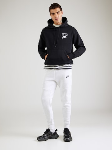 Nike Sportswear Tapered Παντελόνι 'TCH FLC' σε λευκό