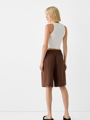 Bershka Loose fit Trousers in Brown