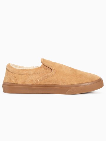 Minnetonka Slip On 'Alden' in Beige