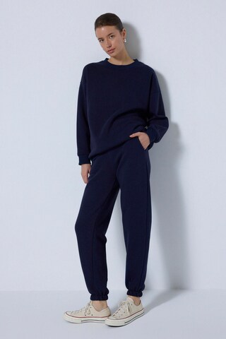 Touche Prive Sweat suit in Blue: front