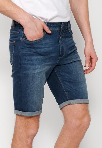 Coupe slim Jean KOROSHI en bleu
