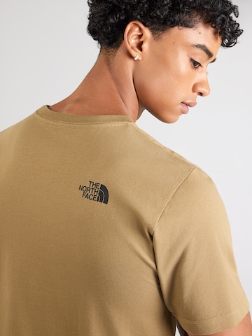 THE NORTH FACE Tričko 'EVOLUTION' – hnědá