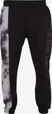Thug Life Tapered Pants in Black: front