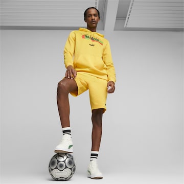 PUMA Sportsweatshirt 'Ghana' in Gelb