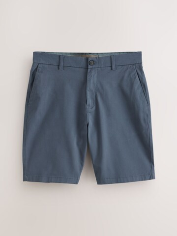 Next Slimfit Chinobyxa i blå