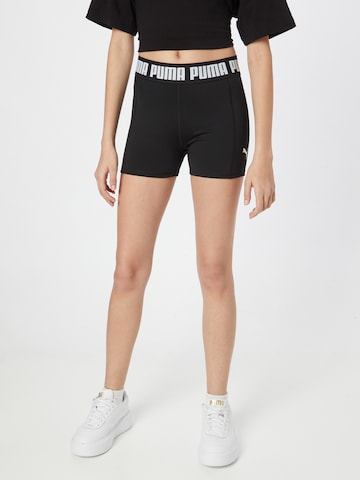 PUMA Skinny Sportbroek in Zwart: voorkant