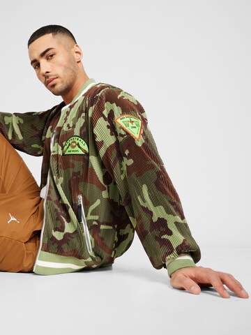 NIKE Sportovní bunda – hnědá